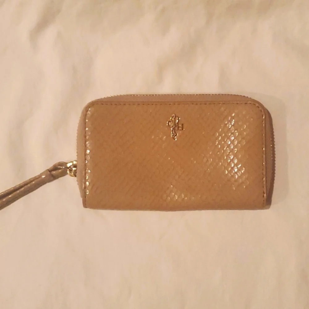 Cole Haan zip around wallet. Snake